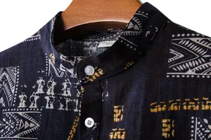Close-up detail of a men's ethnic print casual shirt with a mandarin collar on a hanger