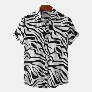 Detailed macro view of a men's stylish zebra print short sleeve shirt on a wooden hanger