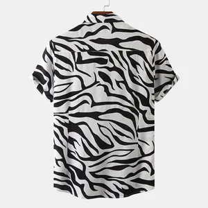 Detailed back view of men's short-sleeved casual shirt with black and white zebra print