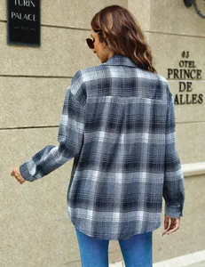 Detailed back view of a blue and grey plaid long-sleeved shirt with a relaxed fit.