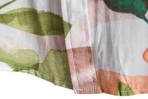 Close-up detail of floral print and stitching on men's casual short sleeve shirt