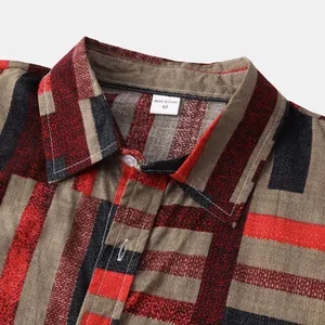 Close-up of men's striped casual shirt showing collar, button, and textured fabric detail.