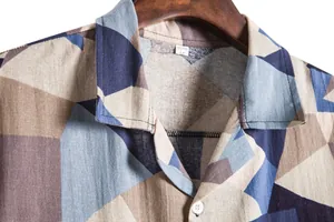Close-up detail of the collar and geometric pattern on this vintage Hawaiian shirt.