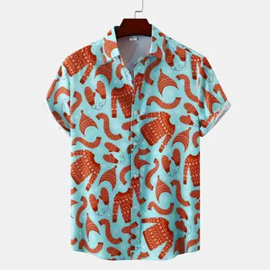 Chemise homme bleu ciel à manches courtes avec motifs hivernaux orange et flocons