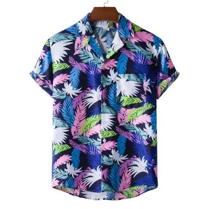 Detailed macro view of men's short-sleeved Hawaiian shirt featuring vibrant tropical leaf pattern