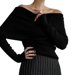 Elegant black off-the-shoulder slim fit long sleeve knitted sweater for women.