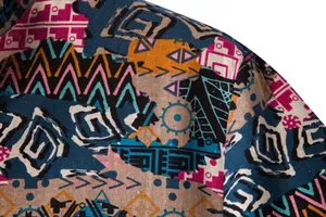 Close-up detail showing the ethnic geometric print of this men's short sleeve shirt