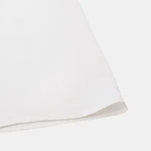 Close-up detail of white men's short sleeve shirt showing stitching and fabric texture