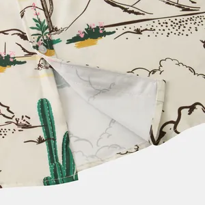 Close-up detail of desert landscape print on a casual men's summer shirt