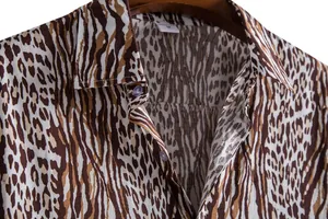 Detail shot of men's leopard print casual shirt showing collar and fabric texture