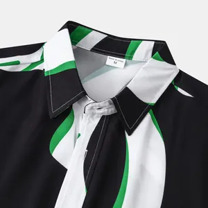 Gros plan détaillé du col de chemise avec imprimé géométrique vert et noir chic