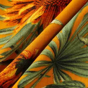 Primo piano di tessuto floreale estivo con trama traspirante e stampa di girasole