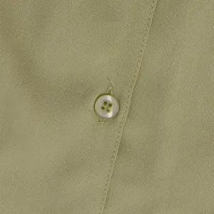 Extreme close-up view showing the olive green shirt fabric texture and a white button