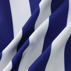 Detail shot of the blue and white vertical stripe fabric texture for men's shirt.