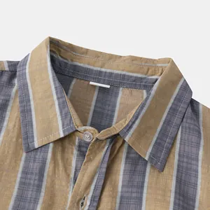 Close-up of striped Hawaiian style men's shirt collar with fine stitching details