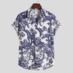 Detail view of men's retro Hawaiian short-sleeved shirt with blue floral print