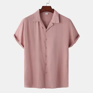 Front view of a dusty rose men's short sleeve shirt displayed on a premium wooden hanger.