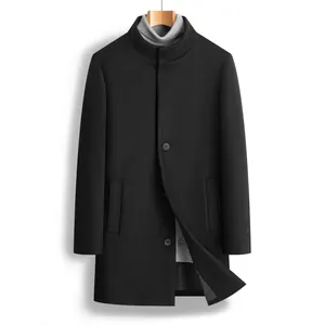Detail of a black men's mid-length wool coat showing slim fit and stand collar design