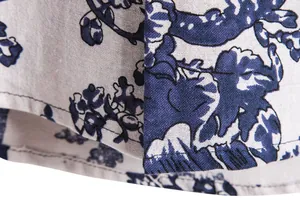 Detailed texture of men's retro Hawaiian print linen-blend casual shirt fabric