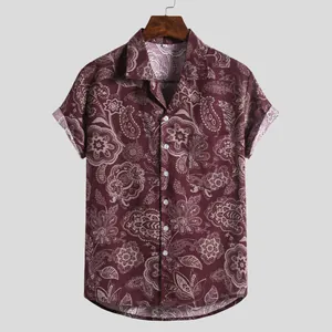 Men's vintage burgundy paisley print short sleeve casual shirt shown on a wooden hanger