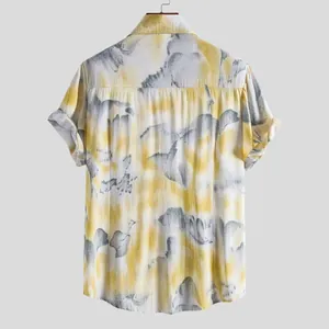 Detailed back view of men's casual short-sleeve shirt featuring yellow abstract tie-dye print
