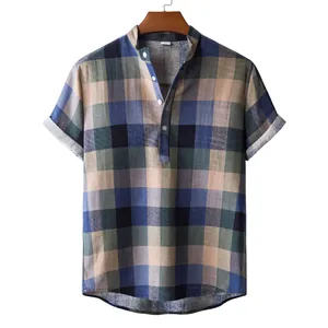 Detailed view of men's short sleeve plaid shirt with linen-cotton texture and stand collar