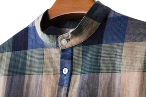 Close-up detail of a men's casual plaid linen shirt with a classic mandarin collar design
