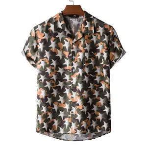 Detailed view of men's Hawaiian short sleeve shirt featuring camo star print and chest pocket