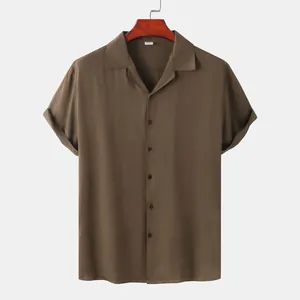 Detailed front view of a brown casual short-sleeve men's shirt featuring a stylish camp collar
