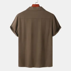 Back view of a minimalist brown short-sleeved casual shirt for men hanging on a hanger