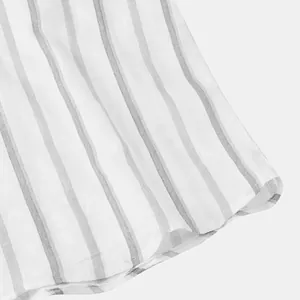Detailed macro view showing the breathable grey and white striped fabric of a men's shirt