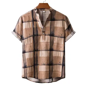 Close-up of men's vintage brown plaid linen shirt with a stylish grandad collar design