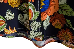 Detailed view of high-quality vintage floral fabric and stitching on men's casual short sleeve shirt