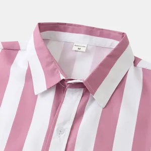 Dettaglio ravvicinato del colletto e dei bottoni di camicia uomo a righe rosa e bianche