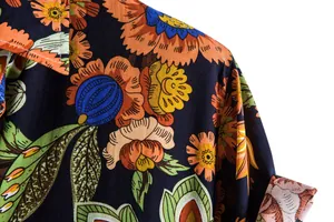 Detail view of vibrant floral print on casual men's summer short sleeve shirt