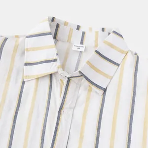 Close-up detail of a men's striped casual shirt collar with size tag M