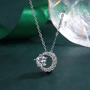 Elegant circular necklace with a single sparkling cubic zirconia pendant in silver finish.