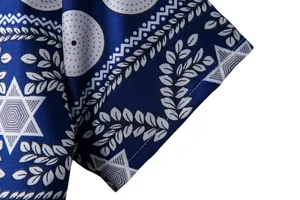 Close-up detail of ethnic print and fabric on blue short sleeve Hawaiian shirt