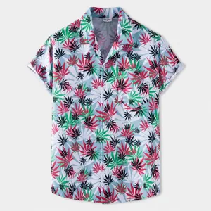 Detailed view of men's Hawaiian beach shirt featuring a colorful tropical leaf print