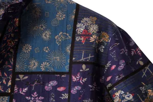 Detailed close-up of patchwork floral print texture on men's vintage cotton linen shirt