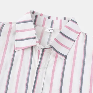 Close-up of a men's summer casual striped shirt collar featuring pink and navy patterns