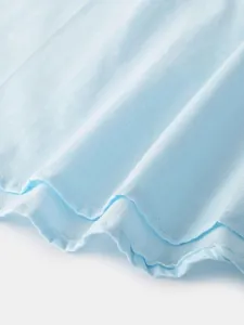 Detailed macro shot of light blue cotton linen shirt fabric texture and stitching