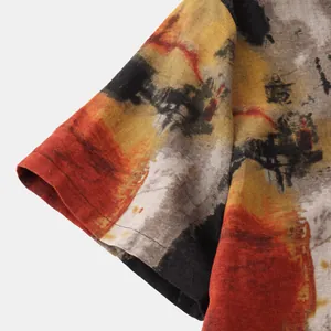 Close-up detail of men's short sleeve shirt with abstract ink-wash print texture