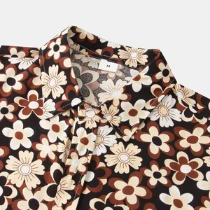 Close-up detail of a vintage floral print men's short sleeve shirt in brown and cream