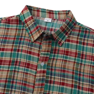 Macro detail of casual Hawaiian plaid shirt collar and buttons with size M label tag
