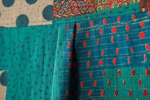 Macro detail of the breathable cotton linen fabric with colorful geometric floral prints