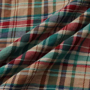 Macro close-up view of the breathable textured plaid fabric for men's casual summer shirts
