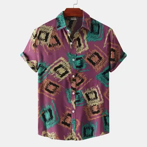 Close-up of a men's vintage purple tribal print short sleeve summer button down shirt