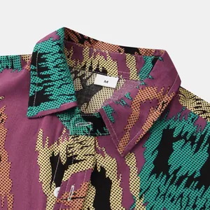 Macro view of vibrant abstract print collar detail on a men's stylish short-sleeved shirt