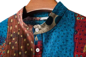 Close-up of men's casual linen-blend shirt with stand collar and colorful patchwork print
